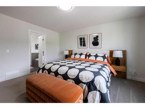 35 Saddlebred Place, Cochrane, AB - Indoor Photo Showing Bedroom