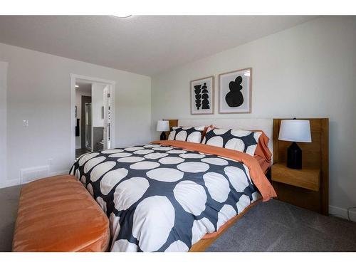 35 Saddlebred Place, Cochrane, AB - Indoor Photo Showing Bedroom