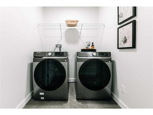 35 Saddlebred Place, Cochrane, AB - Indoor Photo Showing Laundry Room