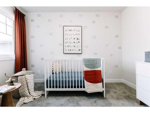 35 Saddlebred Place, Cochrane, AB - Indoor Photo Showing Bedroom