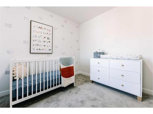 35 Saddlebred Place, Cochrane, AB - Indoor Photo Showing Bedroom