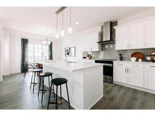 35 Saddlebred Place, Cochrane, AB - Indoor Photo Showing Kitchen With Upgraded Kitchen