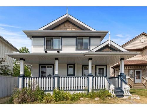 39 Somerside Common Sw, Calgary, AB - Outdoor With Deck Patio Veranda With Facade