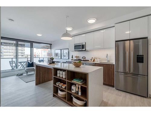 710-327 9A Street Nw, Calgary, AB - Indoor Photo Showing Kitchen With Stainless Steel Kitchen With Upgraded Kitchen