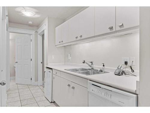 149 Carey, Canmore, AB - Indoor Photo Showing Kitchen With Double Sink