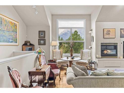 149 Carey, Canmore, AB - Indoor Photo Showing Other Room With Fireplace