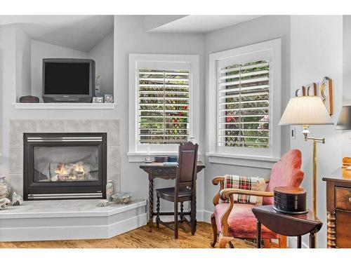 149 Carey, Canmore, AB - Indoor Photo Showing Living Room With Fireplace