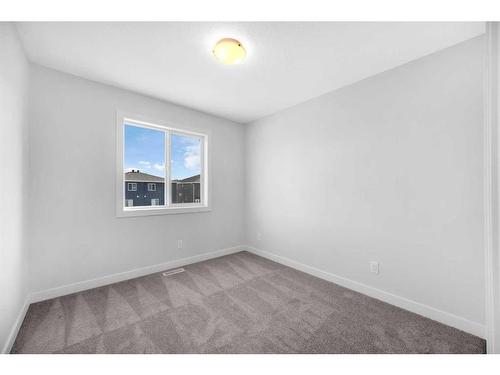 103 Amblefield Avenue Nw, Calgary, AB - Indoor Photo Showing Other Room