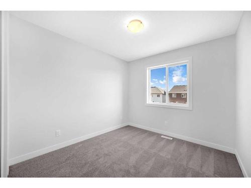 103 Amblefield Avenue Nw, Calgary, AB - Indoor Photo Showing Other Room