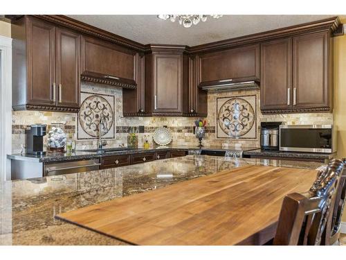 827 Raynard Crescent Se, Calgary, AB - Indoor Photo Showing Kitchen With Double Sink