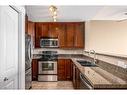 1805-1053 10 Street Sw, Calgary, AB  - Indoor Photo Showing Kitchen With Double Sink 