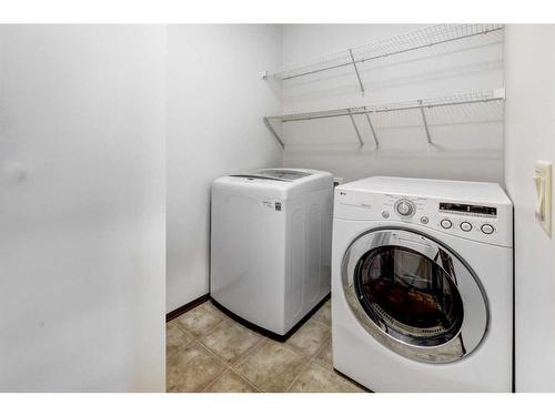 217 Elgin Manor Se, Calgary, AB - Indoor Photo Showing Laundry Room