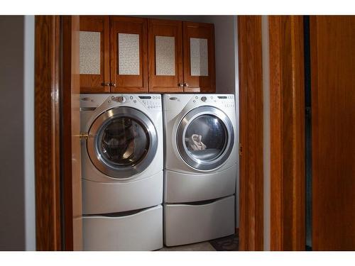 1120 High Country Drive Nw, High River, AB - Indoor Photo Showing Laundry Room