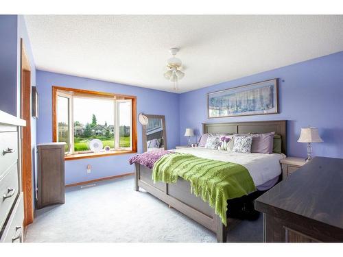 1120 High Country Drive Nw, High River, AB - Indoor Photo Showing Bedroom