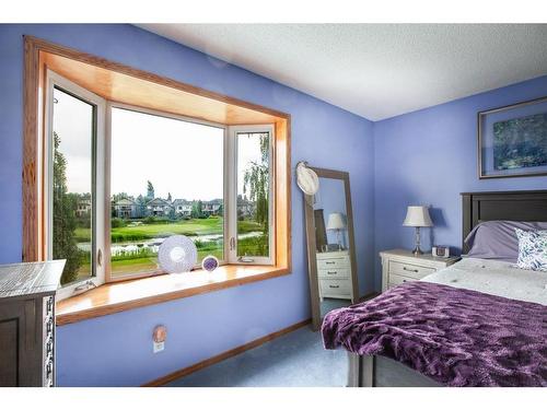 1120 High Country Drive Nw, High River, AB - Indoor Photo Showing Bedroom