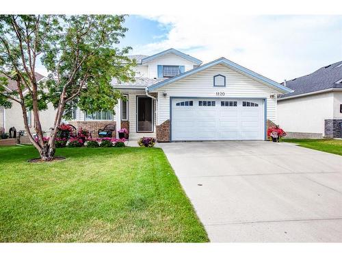 1120 High Country Drive Nw, High River, AB - Outdoor With Facade