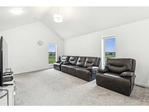 20 Copperhead Place Se, Calgary, AB - Indoor Photo Showing Living Room