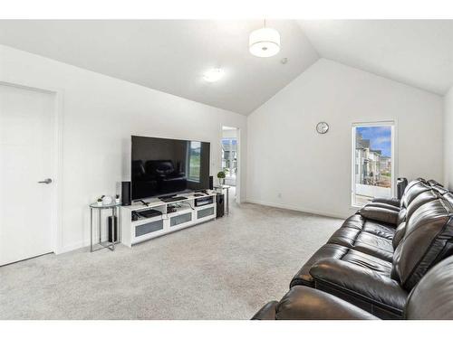 20 Copperhead Place Se, Calgary, AB - Indoor Photo Showing Living Room