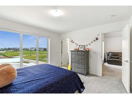 20 Copperhead Place Se, Calgary, AB - Indoor Photo Showing Bedroom