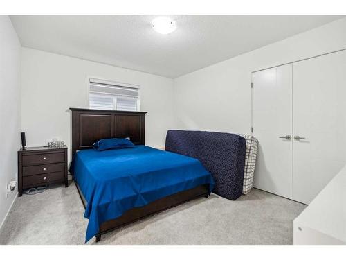 20 Copperhead Place Se, Calgary, AB - Indoor Photo Showing Bedroom