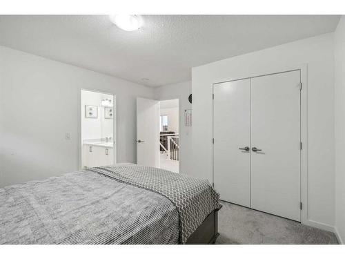 20 Copperhead Place Se, Calgary, AB - Indoor Photo Showing Bedroom