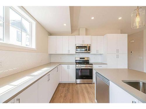 117 South Point Manor Sw, Airdrie, AB - Indoor Photo Showing Kitchen With Stainless Steel Kitchen