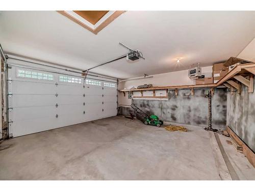 64 Heston Street Nw, Calgary, AB - Indoor Photo Showing Garage