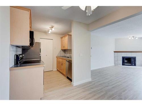 3310-13045 6 Street Sw, Calgary, AB - Indoor Photo Showing Kitchen With Fireplace