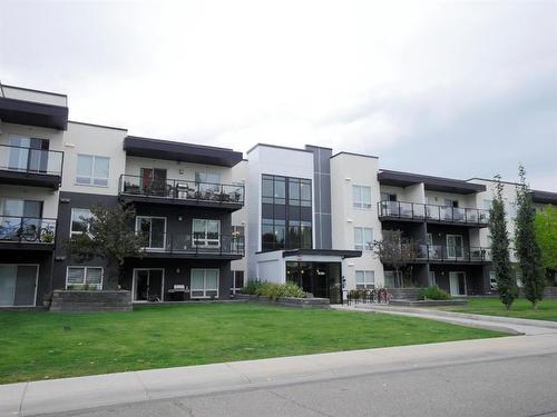 304-15233 1 Street Se, Calgary, AB - Outdoor With Balcony With Facade