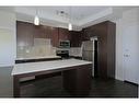 304-15233 1 Street Se, Calgary, AB  - Indoor Photo Showing Kitchen 