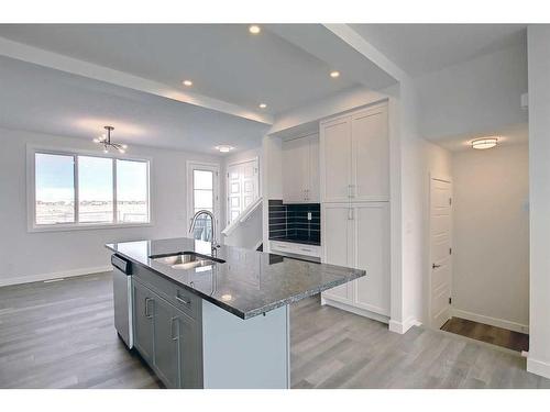 341 Waterford Boulevard, Chestermere, AB - Indoor Photo Showing Kitchen With Double Sink