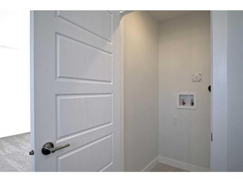 341 Waterford Boulevard, Chestermere, AB - Indoor Photo Showing Other Room