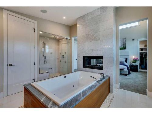 2002 25A Street Sw, Calgary, AB - Indoor Photo Showing Bathroom With Fireplace