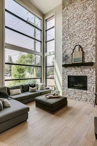 2002 25A Street Sw, Calgary, AB - Indoor Photo Showing Living Room With Fireplace