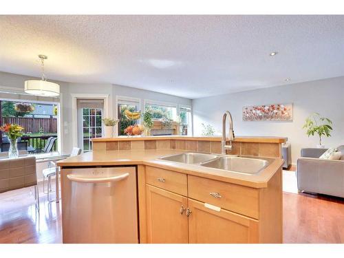 319 Springborough Way Sw, Calgary, AB - Indoor Photo Showing Kitchen With Double Sink