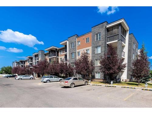 217-7110 80 Avenue Ne, Calgary, AB - Outdoor With Facade