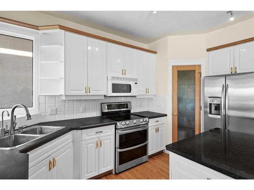 55 Schiller Crescent Nw, Calgary, AB - Indoor Photo Showing Kitchen With Stainless Steel Kitchen With Double Sink