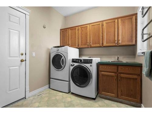 55 Schiller Crescent Nw, Calgary, AB - Indoor Photo Showing Laundry Room