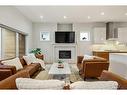 4627 21 Avenue Nw, Calgary, AB  - Indoor Photo Showing Living Room With Fireplace 