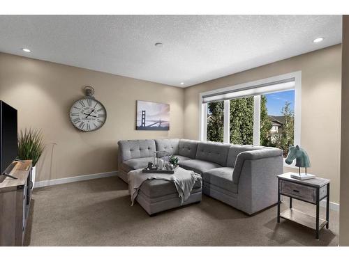 161 Aspenshire Crescent Sw, Calgary, AB - Indoor Photo Showing Living Room