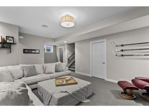 161 Aspenshire Crescent Sw, Calgary, AB - Indoor Photo Showing Living Room