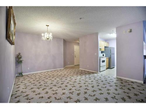 207-2022 Canyon Meadows Drive Se, Calgary, AB - Indoor Photo Showing Other Room