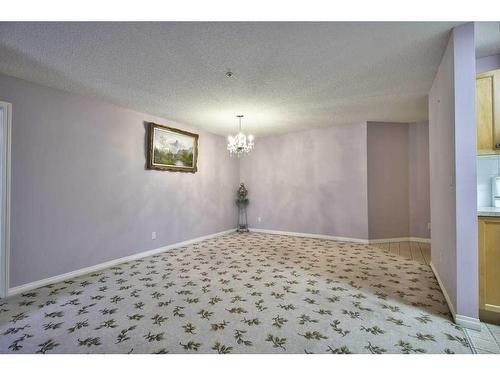 207-2022 Canyon Meadows Drive Se, Calgary, AB - Indoor Photo Showing Other Room