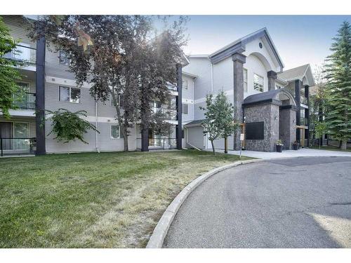 207-2022 Canyon Meadows Drive Se, Calgary, AB - Outdoor With Facade