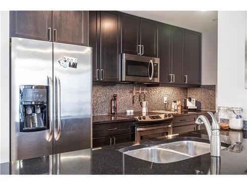 2405-211 13 Avenue Se, Calgary, AB - Indoor Photo Showing Kitchen With Stainless Steel Kitchen With Double Sink With Upgraded Kitchen