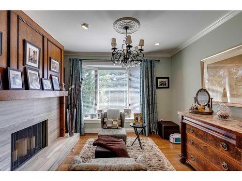 6-35 Oakmount Court Sw, Calgary, AB - Indoor Photo Showing Living Room With Fireplace