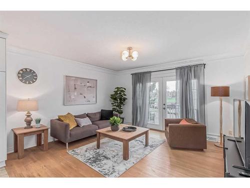 2820 Morley Trail Nw, Calgary, AB - Indoor Photo Showing Living Room