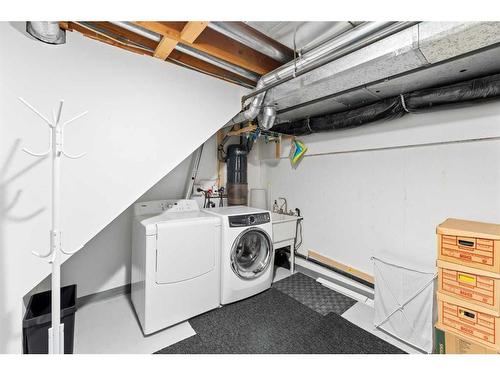 403-3131 63 Avenue Sw, Calgary, AB - Indoor Photo Showing Laundry Room