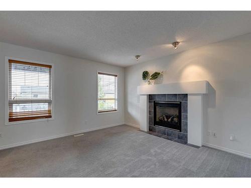 106 Skyview Springs Rise Ne, Calgary, AB - Indoor Photo Showing Living Room With Fireplace