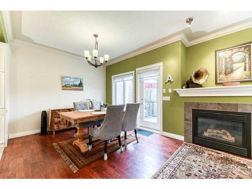 28-100 Signature Way Sw, Calgary, AB - Indoor With Fireplace